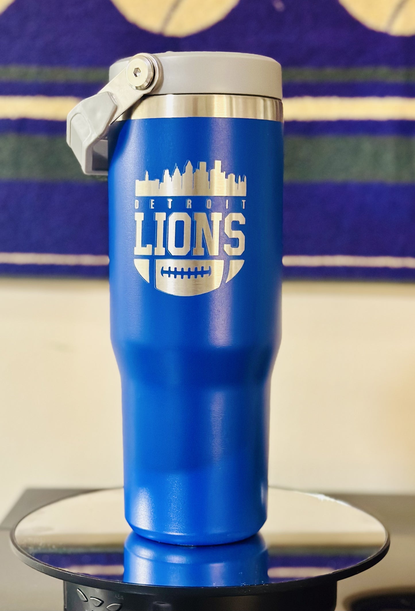 Sports Tumblers - Baltimore Ravens (purple), Lions (blue) and Eagles (green).