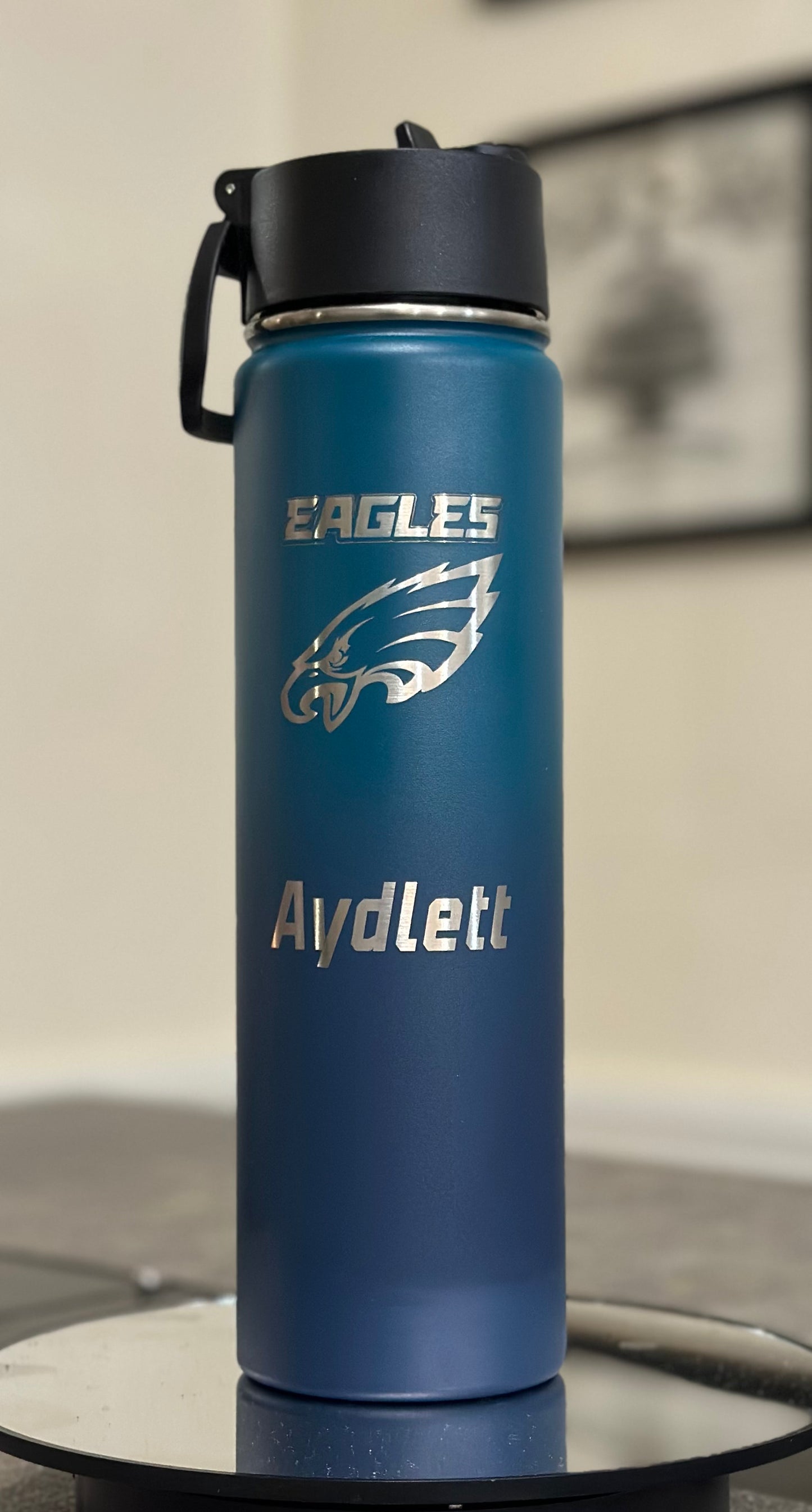 Sports Tumblers - Baltimore Ravens (purple), Lions (blue) and Eagles (green).